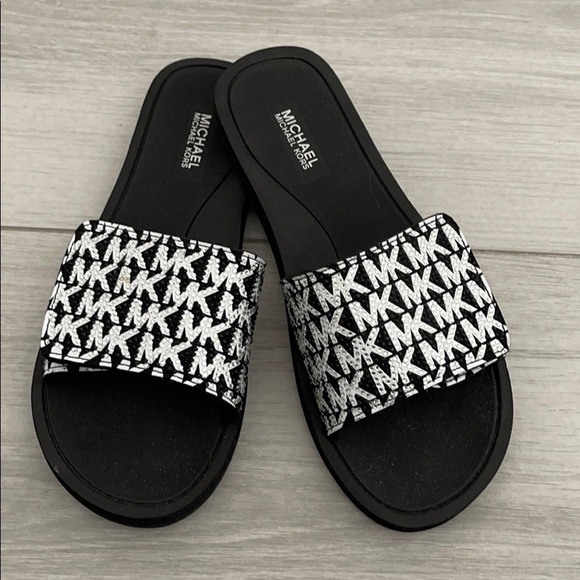 black and white michael kors slides